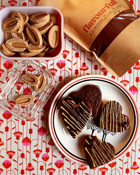 Valrhona Dulcey feves, Valrhona cocoa powder and heart-shaped Chocolate Love Letter Cookies with Crispearl decorations