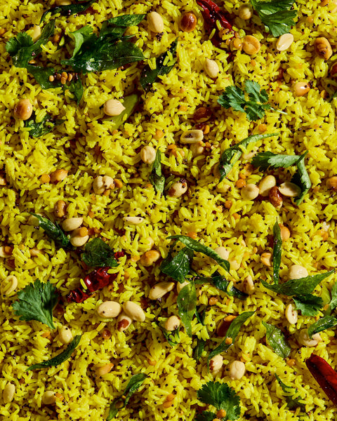 Andhra lemon rice with turmeric, peanuts and curry leaves