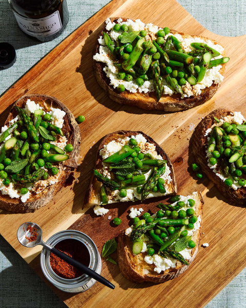 Spring Asparagus Tartines with Ricotta and Black Garlic Oil