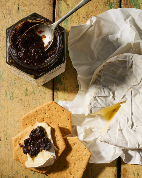 Hawkshead Relish Black Garlic Pickle on brie and crackers