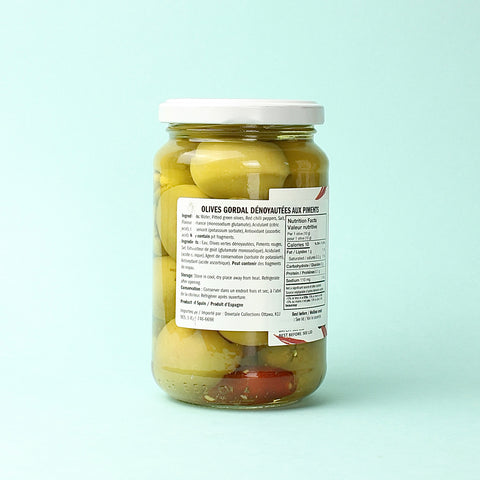 A jar of Silver and Green Chilli Gordal Olives turned to show the ingredients list